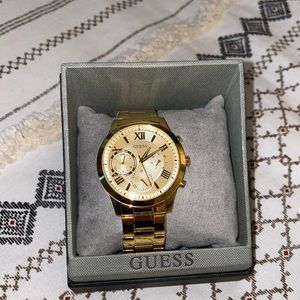Gold guess watch